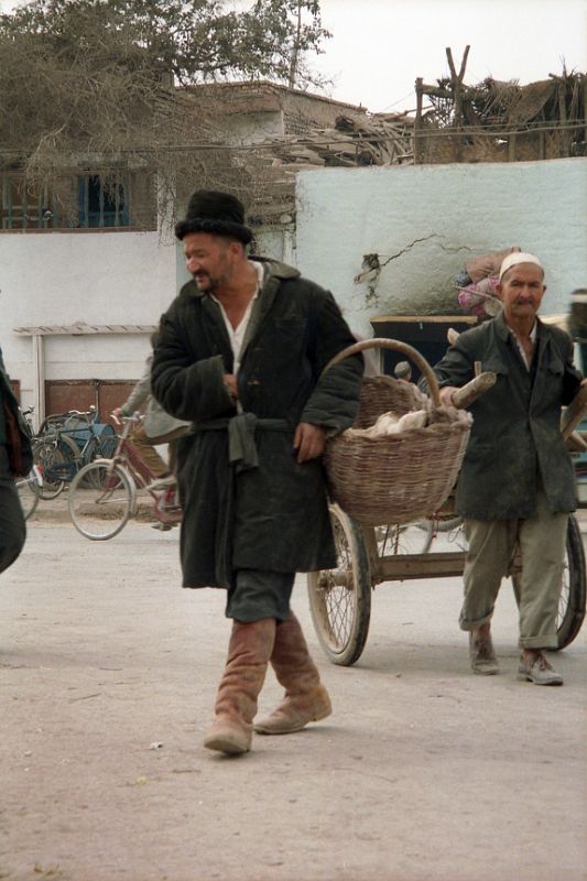 16 Kashgar Old City Street Scene 1993 Man Carrying Basket
